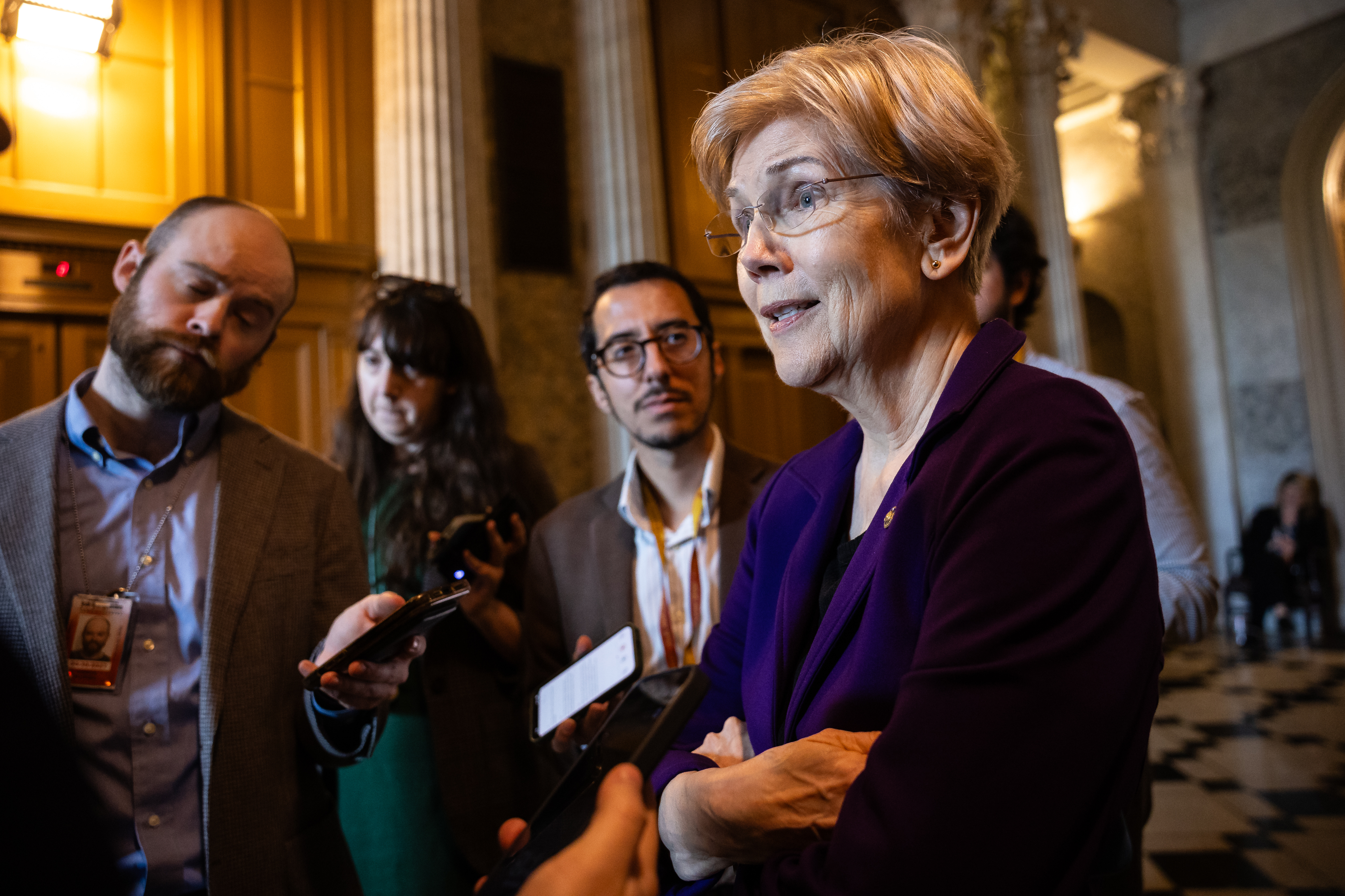 Senator Elizabeth Warren has found herself in rare alignment with the banking industry, as progressive Democrats and financial groups fight provisions in a landmark crypto bill.