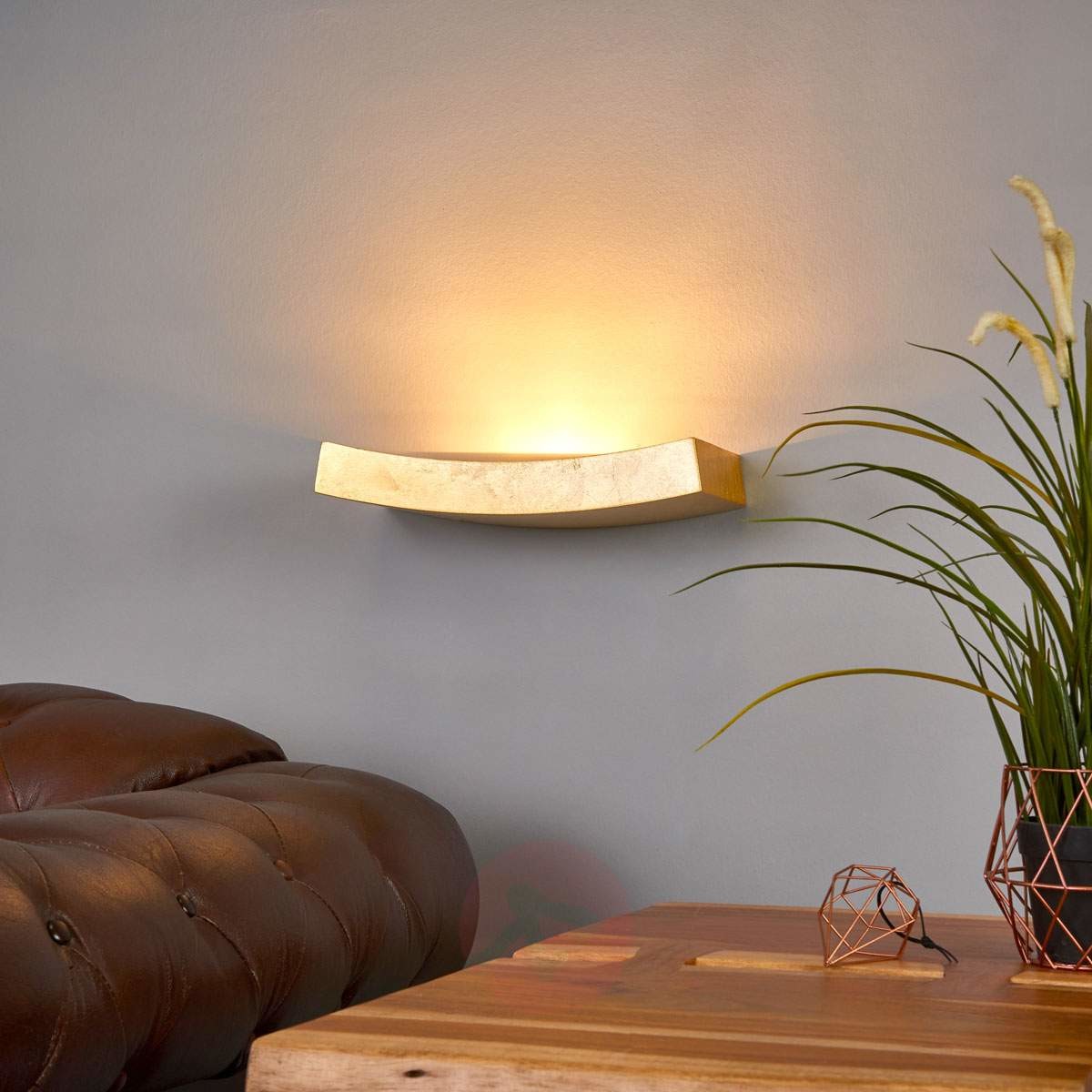 Złota wygięta lampa ścienna Berra