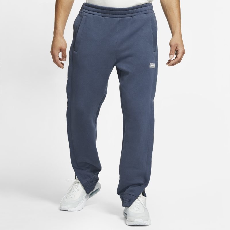 Nike Męskie spodnie piłkarskie z dzianiny F.C. - Niebieski CV1488-437