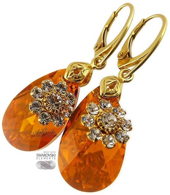 Swarovski piękne kolczyki TOPAZ GOLD FLOWER