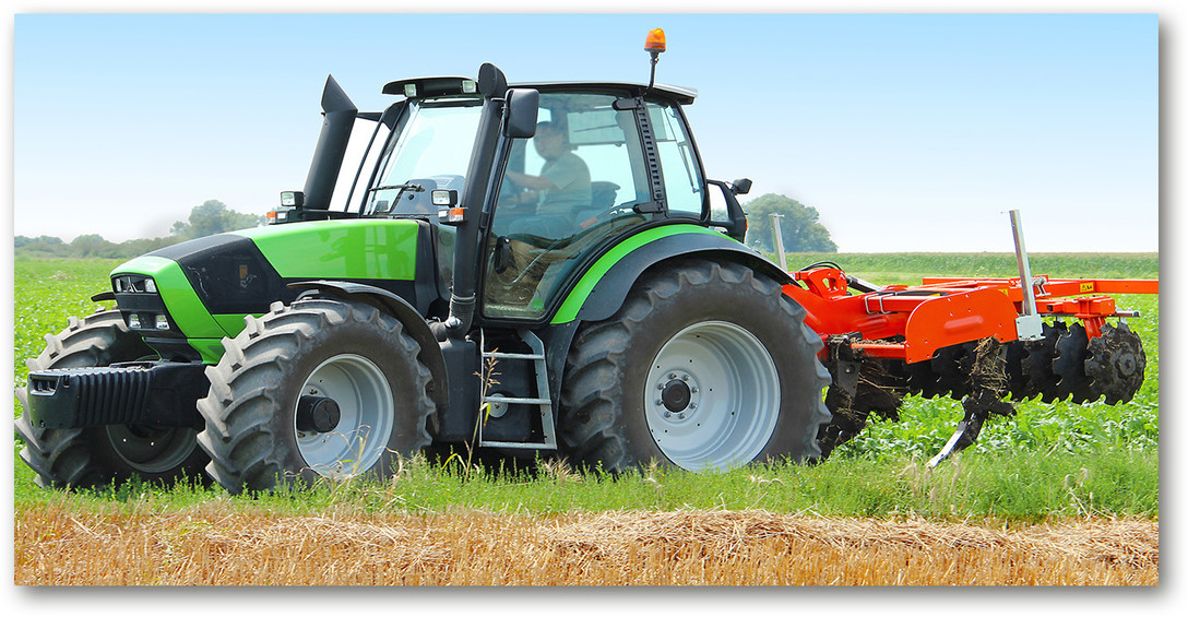 Obraz zdjęcie szkło akryl Traktor na polu