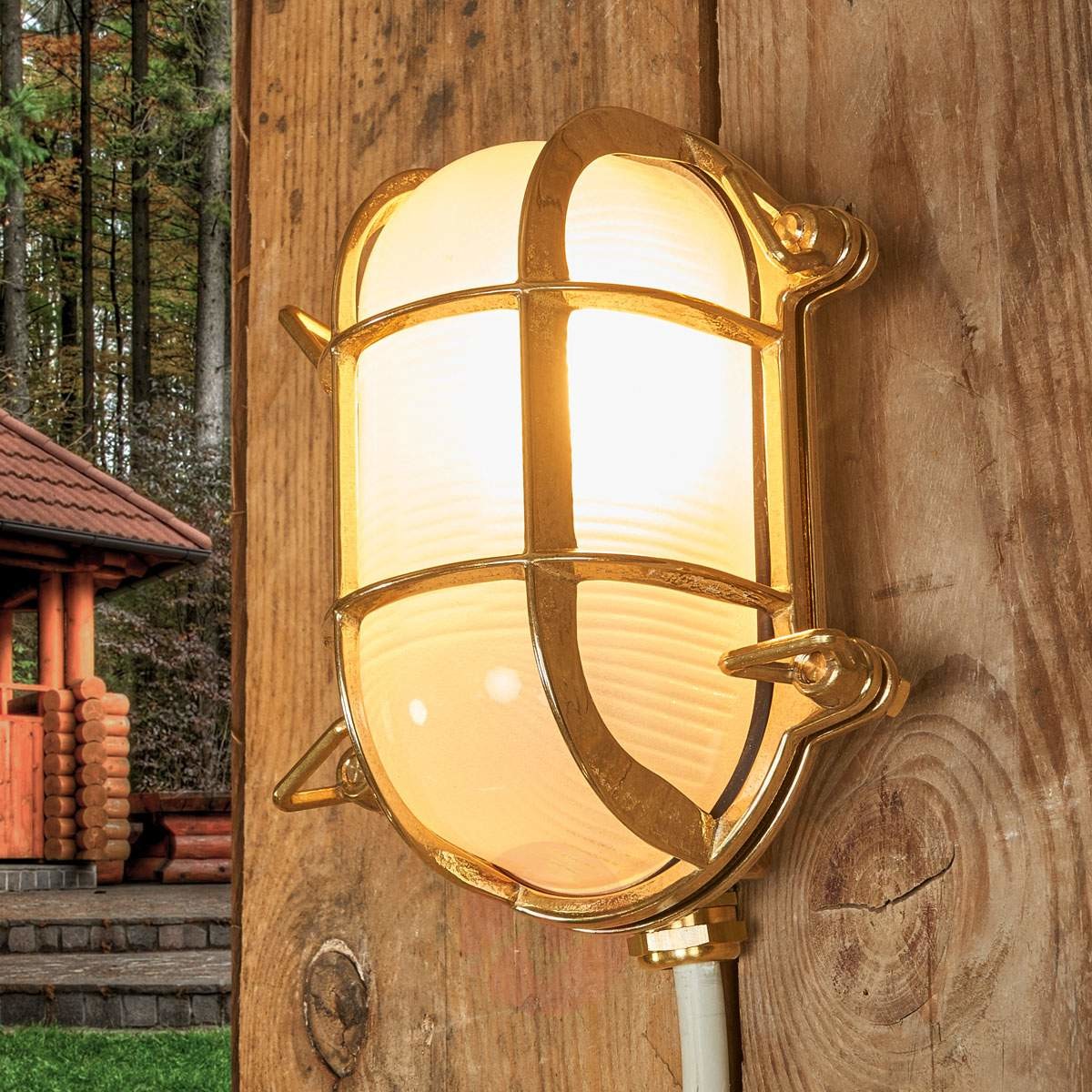 MORETTI Moretti Owalna zewnętrzna lampa ścienna BENGT z mosiądzu
