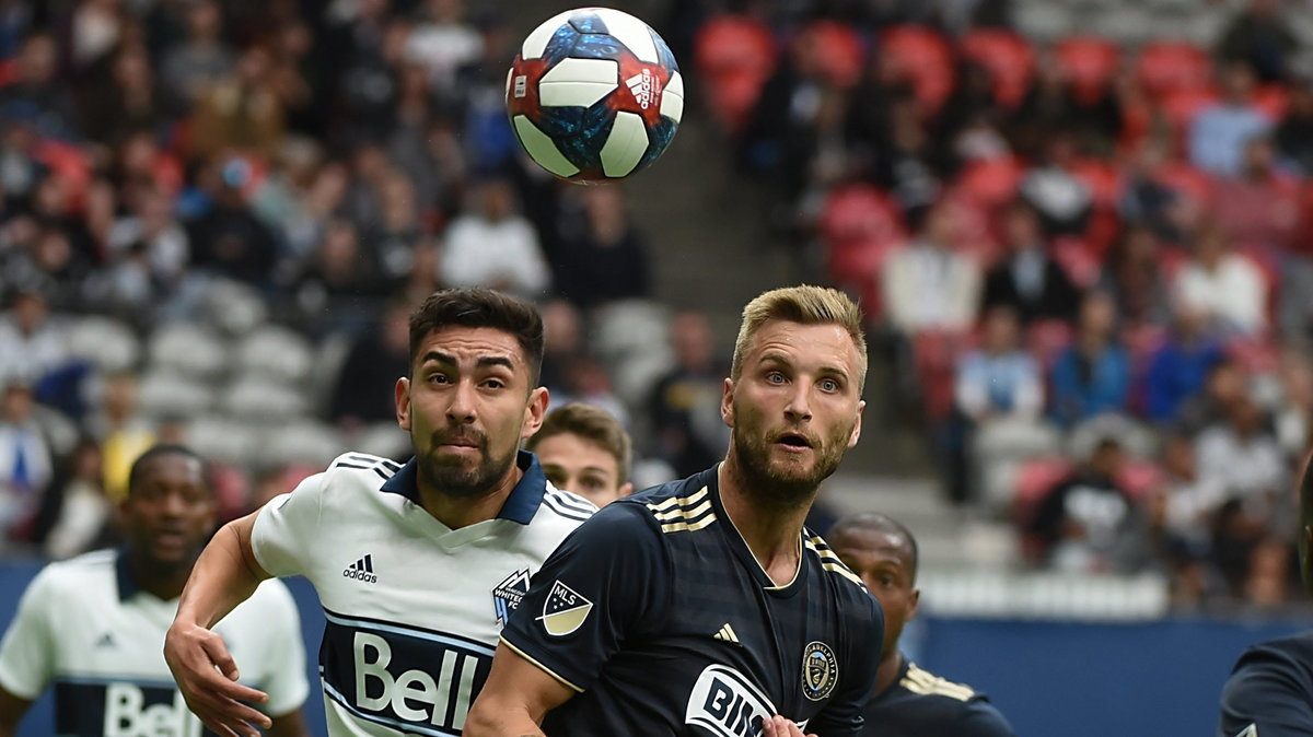 Kacper Przybyłko (z prawej) w meczu z Vancouver Whitecaps