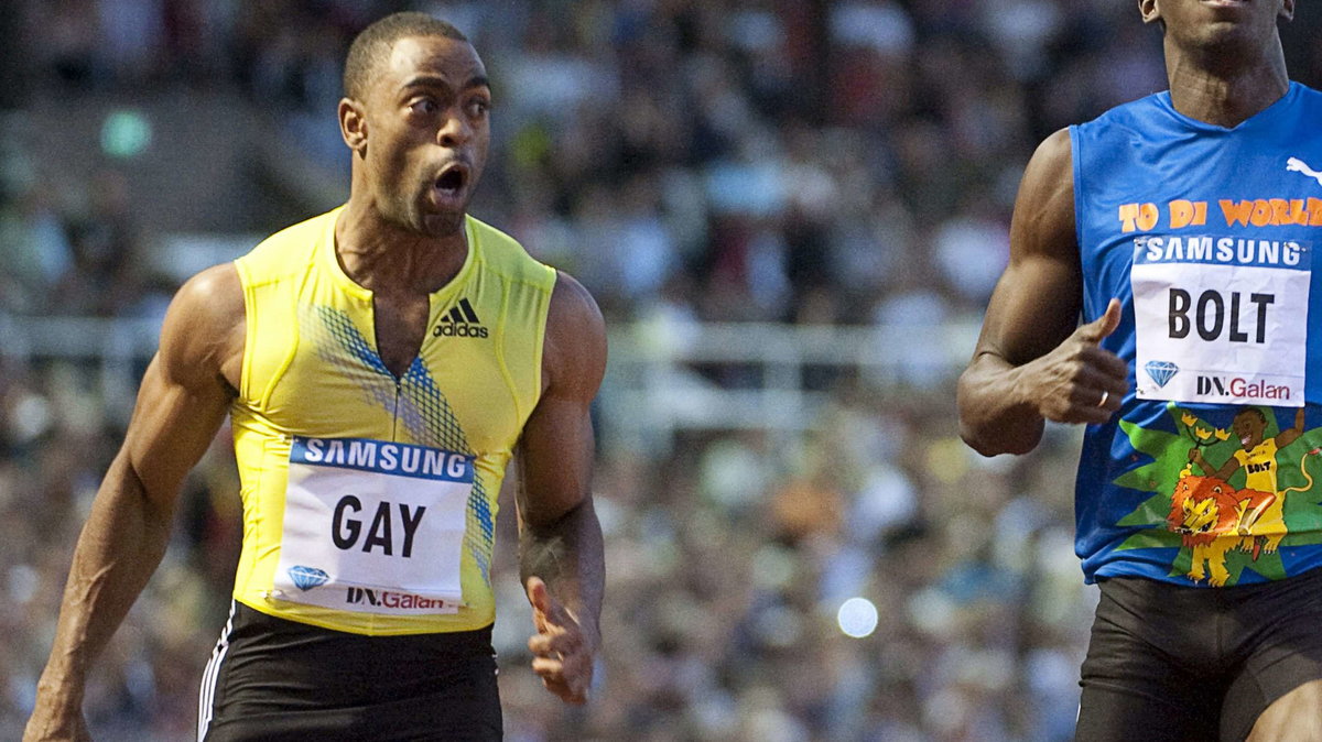 Tyson Gay (L) i Usain Bolt (P)