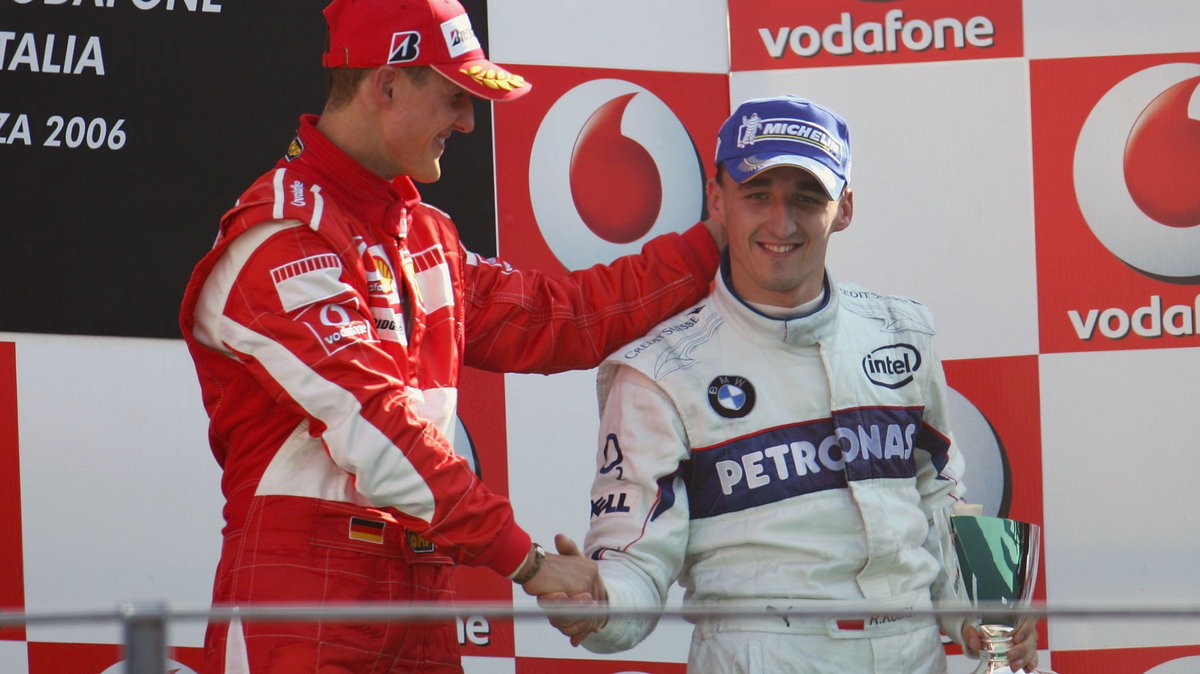 Robert Kubica (P) i Michael Schumacher na podium