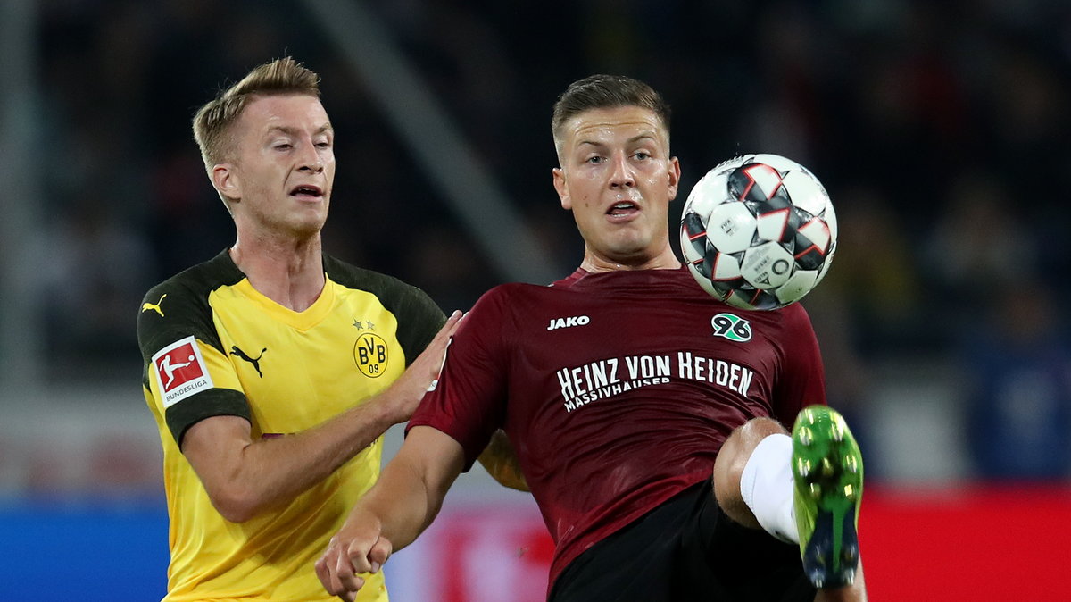 Marco Reus i Kevin Wimmer. Hannover – Borussia Dortmund