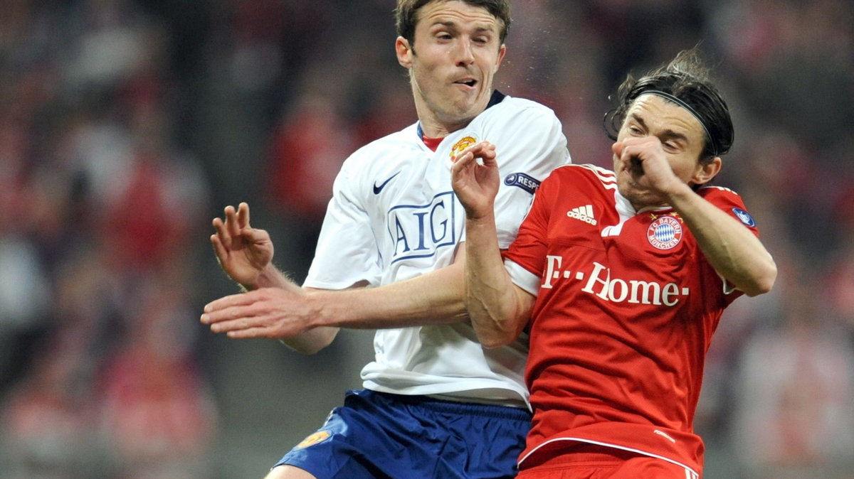 Michael Carrick (L) i Daniel Pranjic (P)