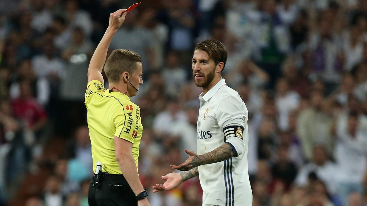 Real Madrid's Sergio Ramos is shown a red card by referee Alejandro Hernandez