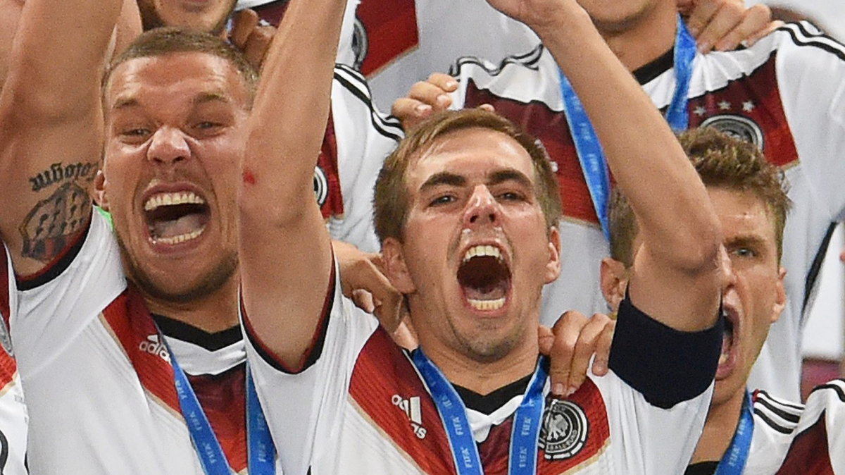 Lukas Podolski (L), Philipp Lahm, Thomas Mueller