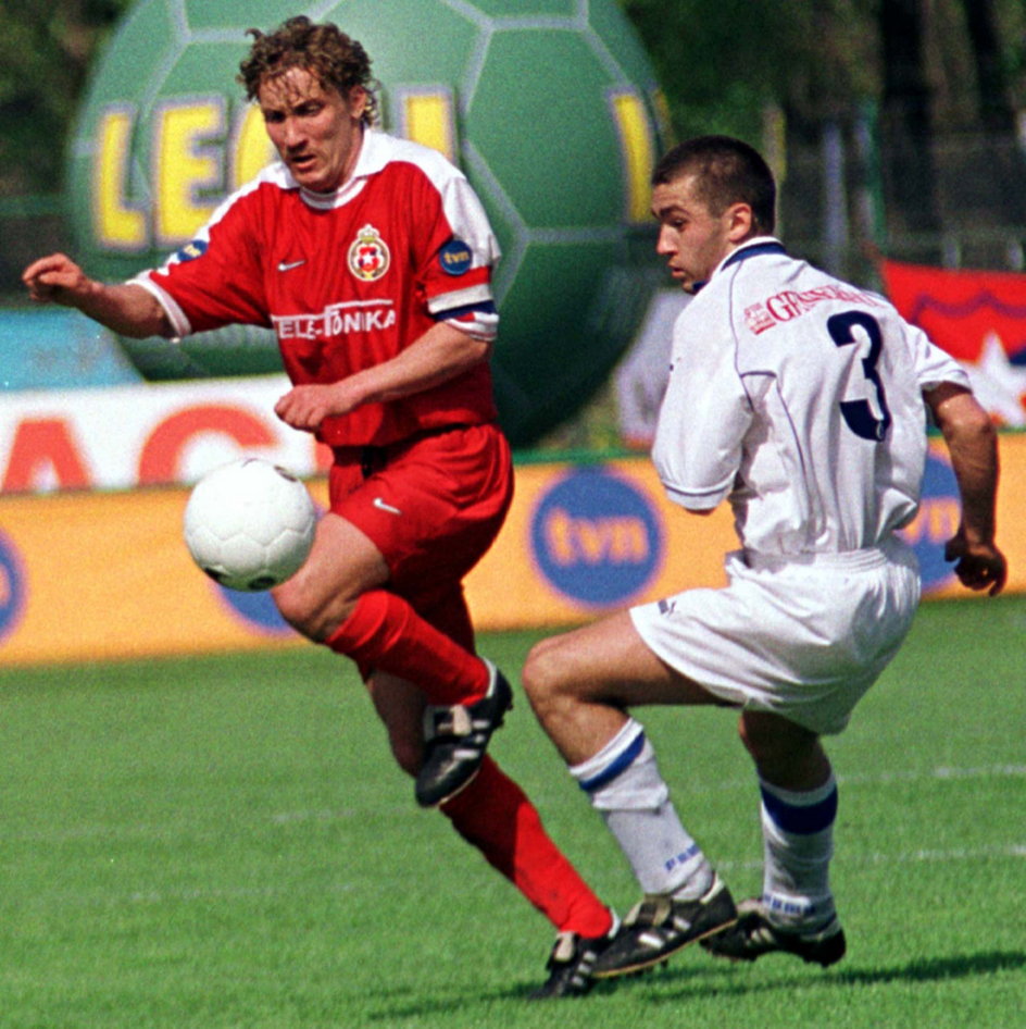Tomasz Kulawik (w czerwonym stroju) w barwach Wisły Kraków