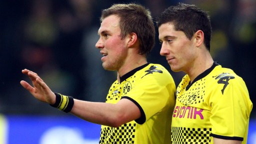 Kevin Grosskreutz (L) i Robert Lewandowski (P)