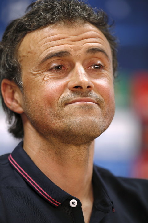 Barcelona's coach Luis Enrique smiles during a news conference after a training session at Ciutat Esportiva Joan Gamper in Sant Joan Despi near Barcelona