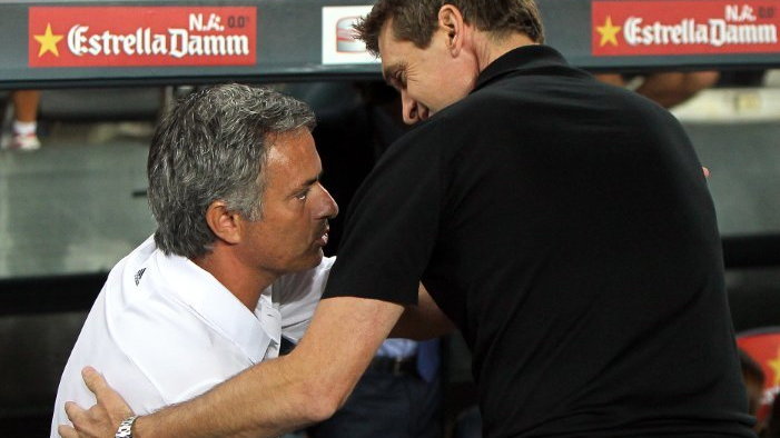 Jose Mourinho (L)