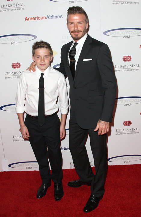 Brooklyn Beckham z tatą Davidem w 2012 roku