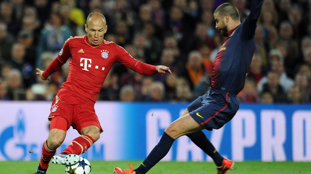 Gerard Pique i Arjen Robben 