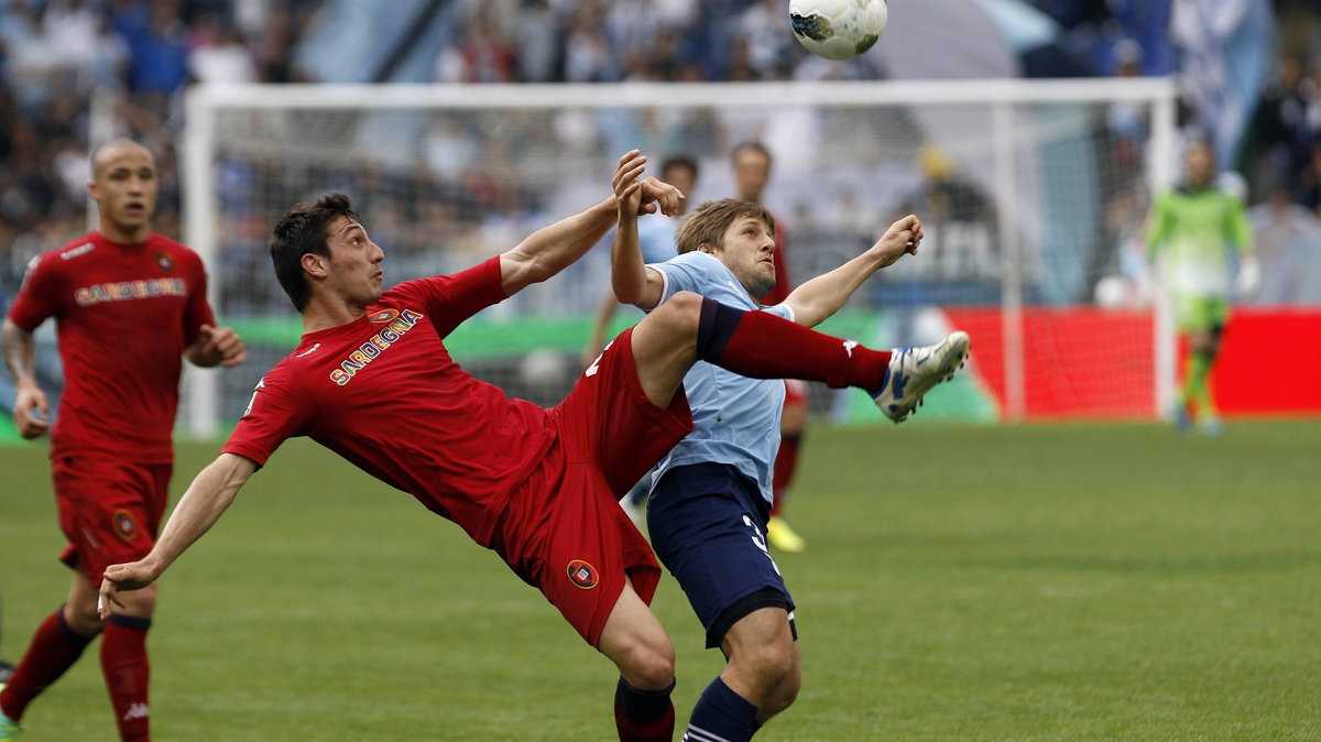 Davide Astori (L)