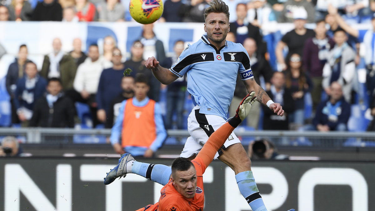 Ciro Immobile (Lazio Rzym) i Łukasz Skorupski (Bologna)