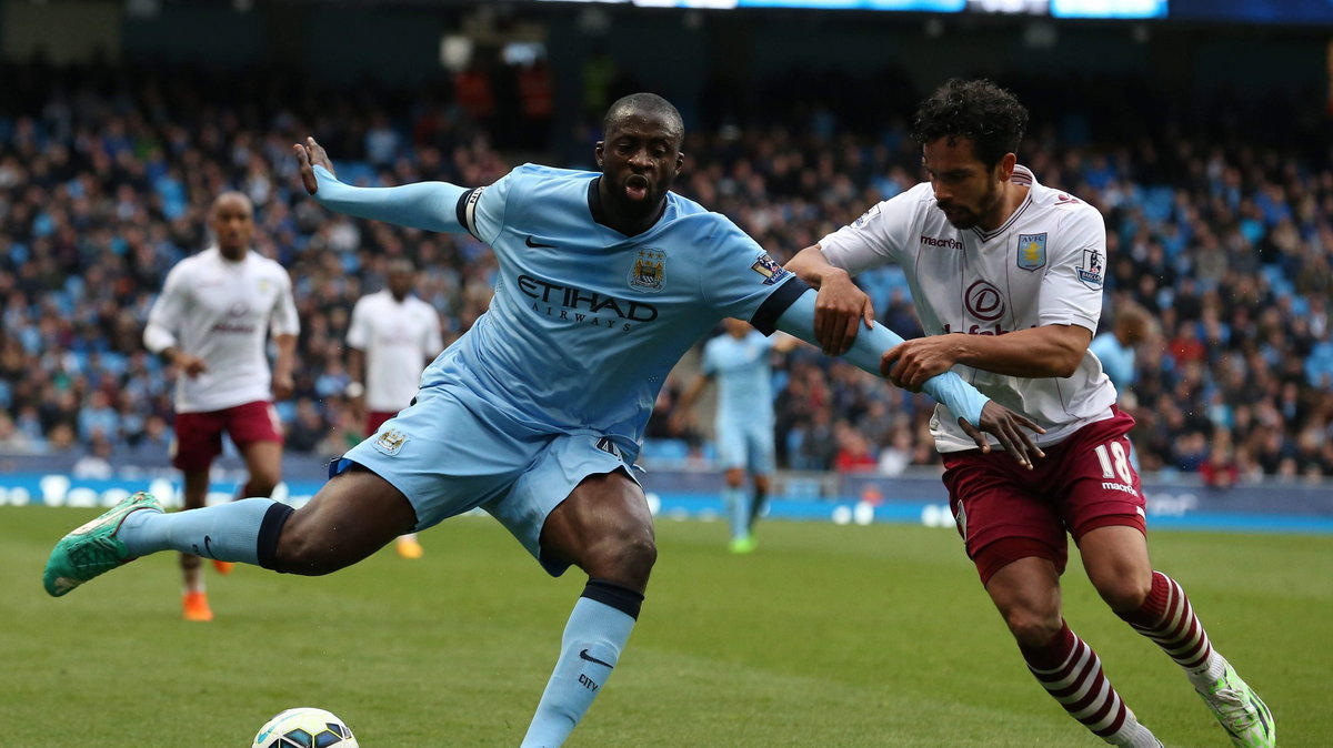 Yaya Toure (L)