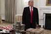 epa07284511 - USA TRUMP (United States President Donald J. Trump presents fast food to be served to the Clemson Tigers during White House visit)