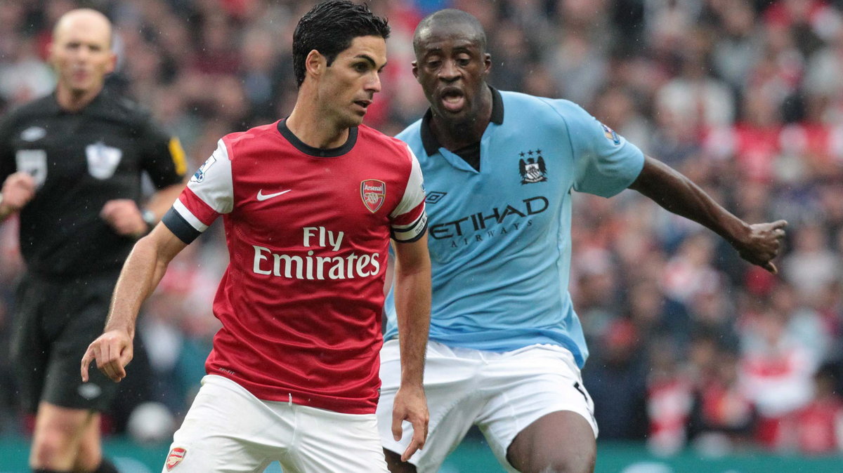 Mikel Arteta (L)