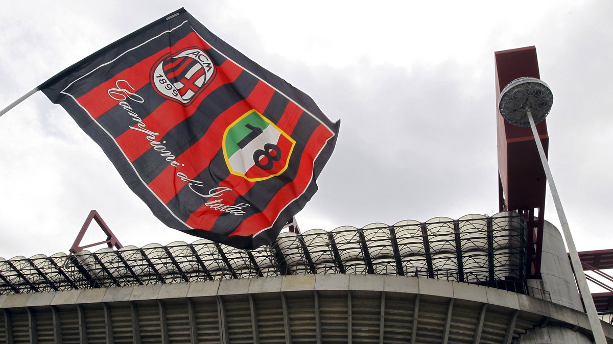 File photo of AC Milan's flag flutters in front of San Siro stadium in Milan