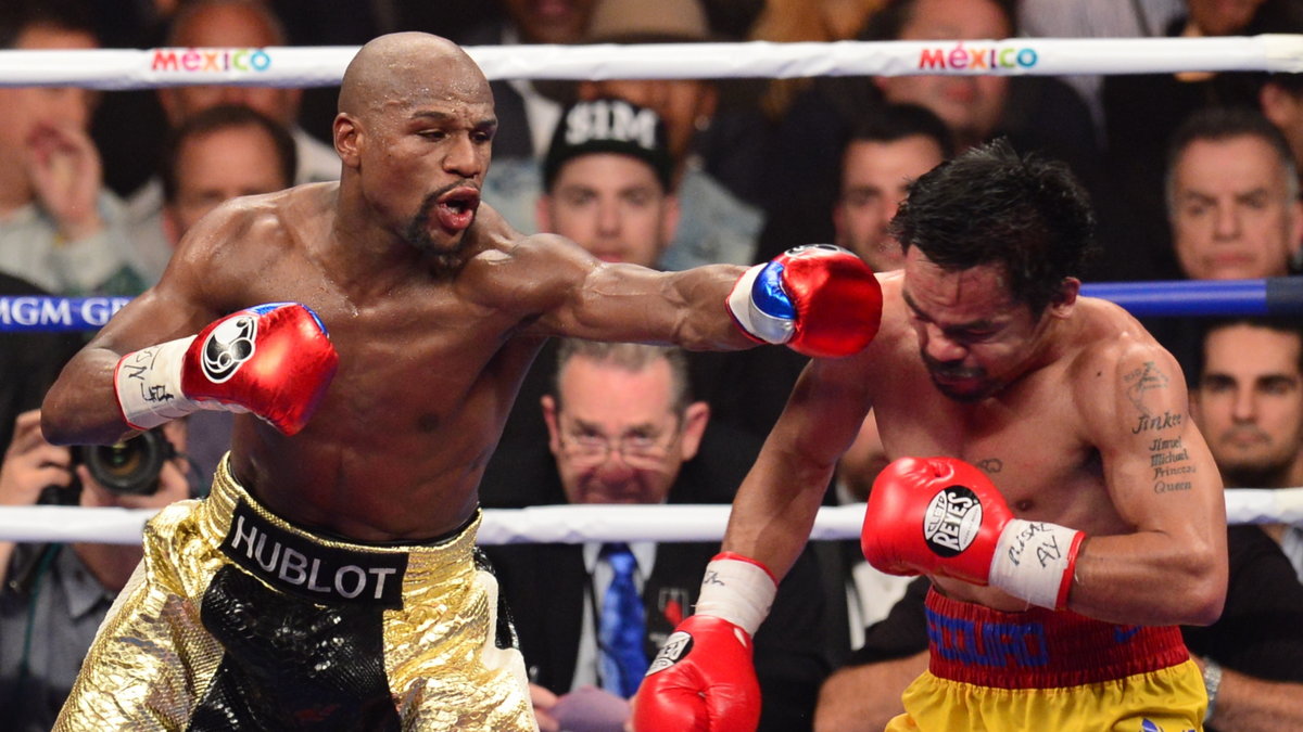 Floyd Mayweather Jr. (L)