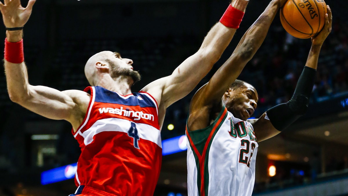 MArcin Gortat (L)