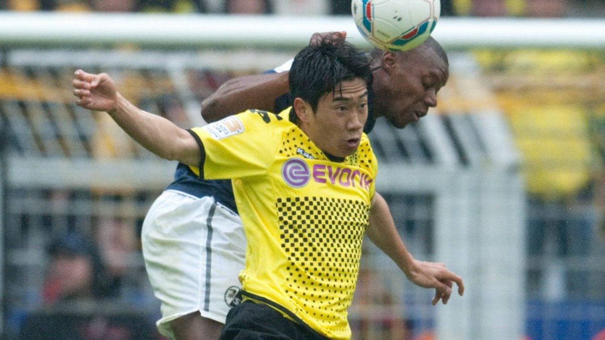 Shinji Kagawa (w żółtej koszulce)