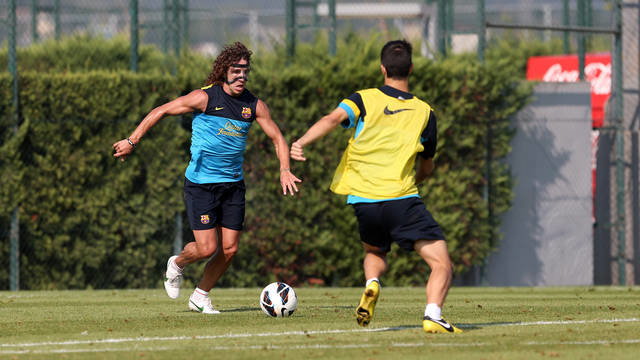 Puyol w masce ochronnej