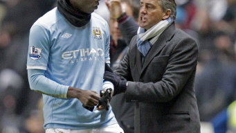 Mario Balotelli i Roberto Mancini (P)