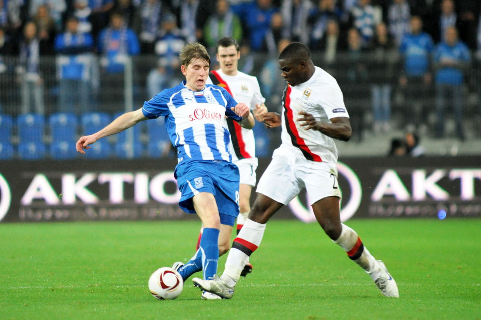 Jacek Kiełb i Micah Richards podczas meczu Lech Poznań - Manchester City (4 listopada 2010 r.)