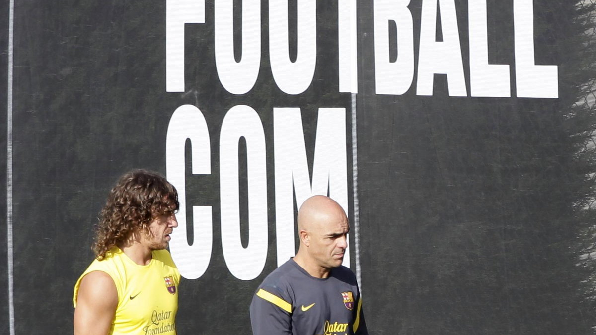 Carles Puyol (po lewej)