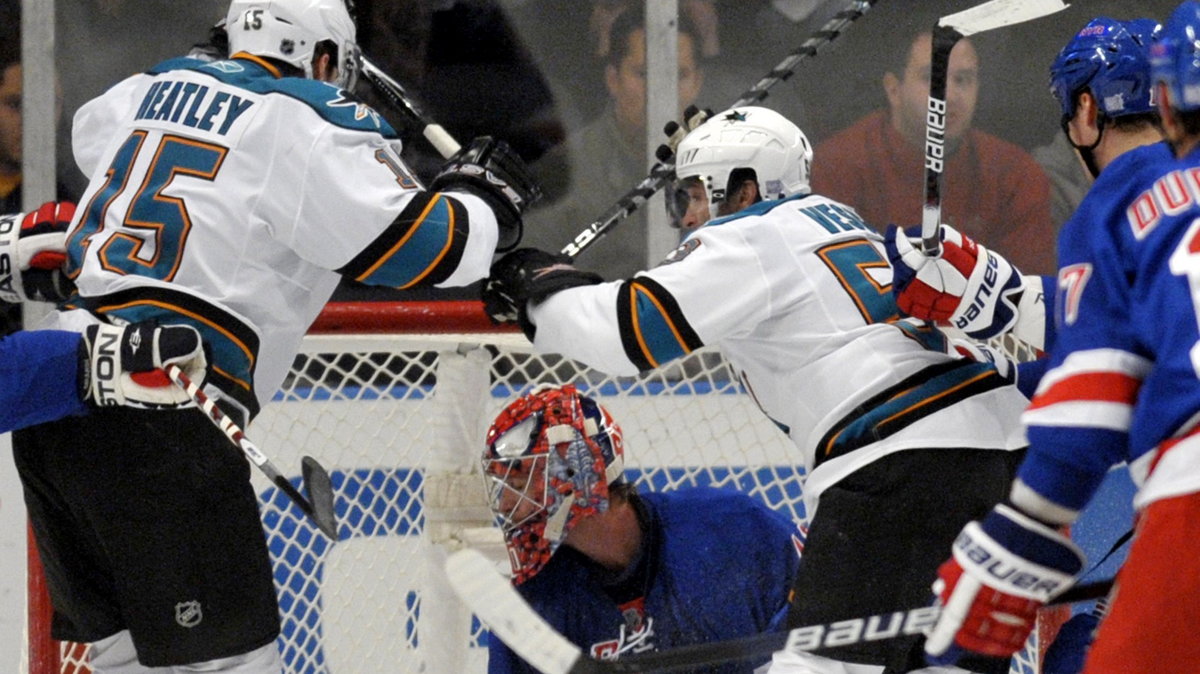 Rangers' Valiquette lets a shot by Sharks