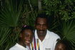 Serena Williams stands with her sister Venus Williams and father Richard Williams at a tennis camp in Florida. 1992