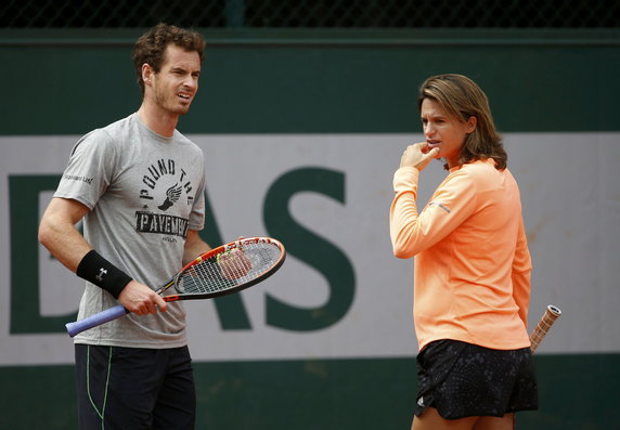 Britain's Murray listen to his coach and former tennis player Mauresmo during a training session for the French Open tennis tournament at the Roland Garros stadium in Paris