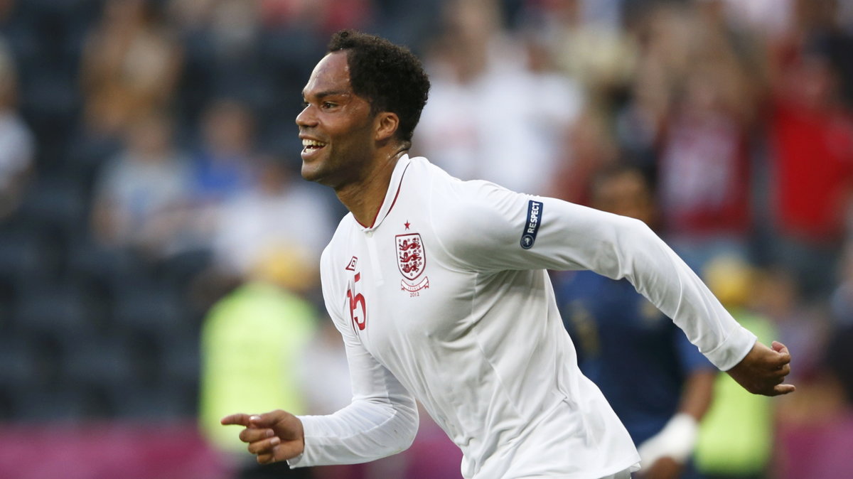 England's Lescott celebrates a goal against France during the Euro 2012 Group D soccer match at Donbass Arena in Donetsk