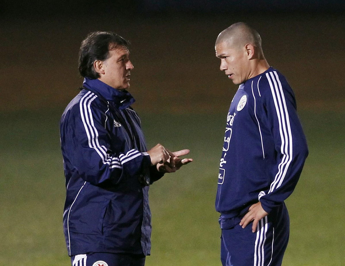 Gerardo Martino (L)