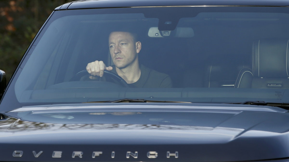 Chelsea's captain John Terry arrives for training the day after manager Jose Mourinho was sacked at the team's training facility in Cobham, southern England