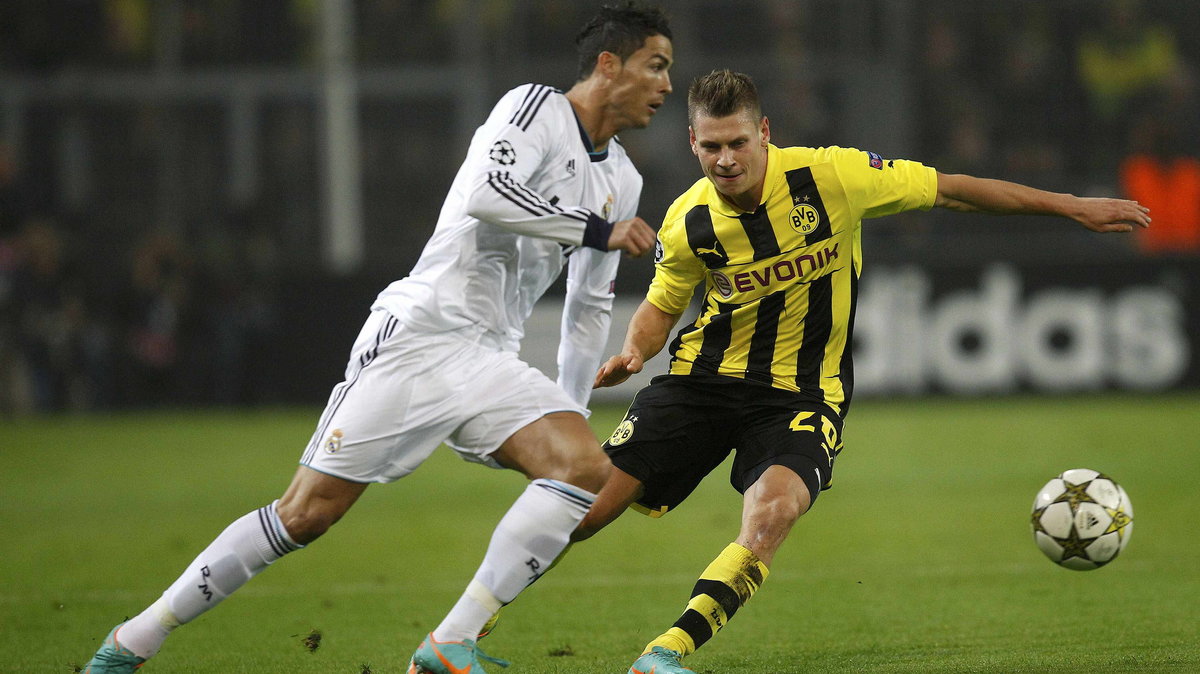 Cristiano Ronaldo (L) i Łukasz Piszczek (P)