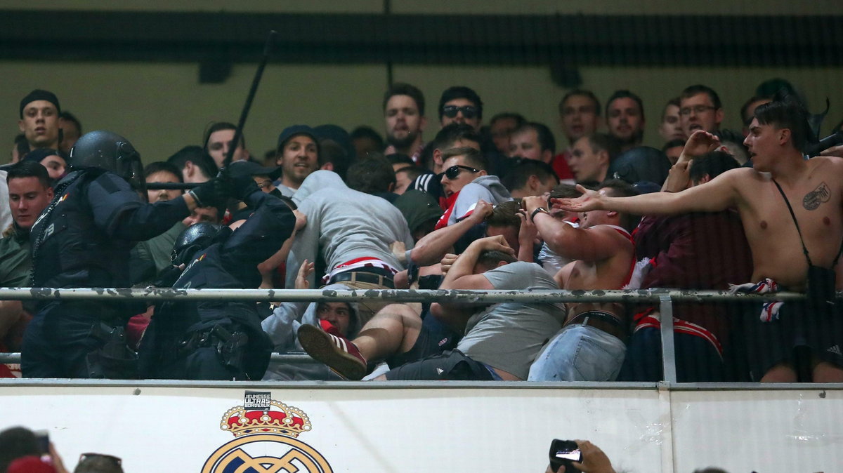 Fans clash with police during the match