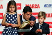 Barcelona's Suarez poses with European Golden Shoe trophy during a ceremony in Barcelona