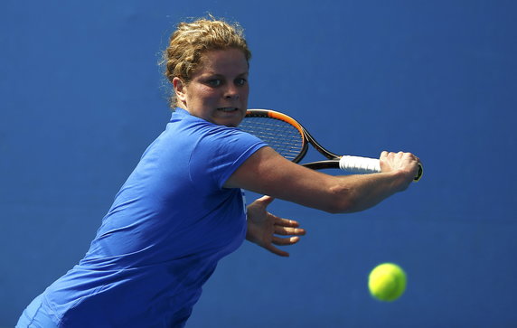 Belgium's Kim Clijsters hits a shot during a practice session at Melbourne Park, Australia