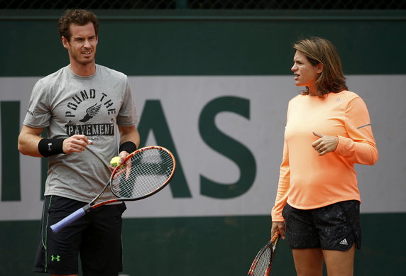 Britain's Murray listen to his coach and former tennis player Mauresmo during a training session for the French Open tennis tournament at the Roland Garros stadium in Paris