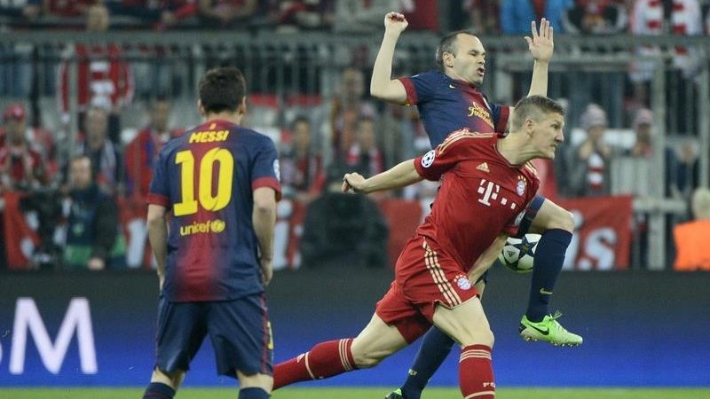 Bastian Schweinsteiger, Andres Iniesta i Leo Messi w meczu Bayern- Barcelona