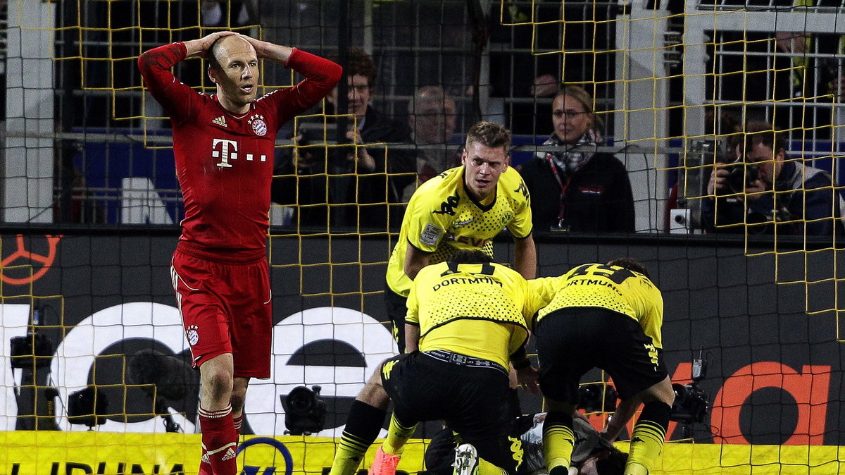 Arjen Robben (L)