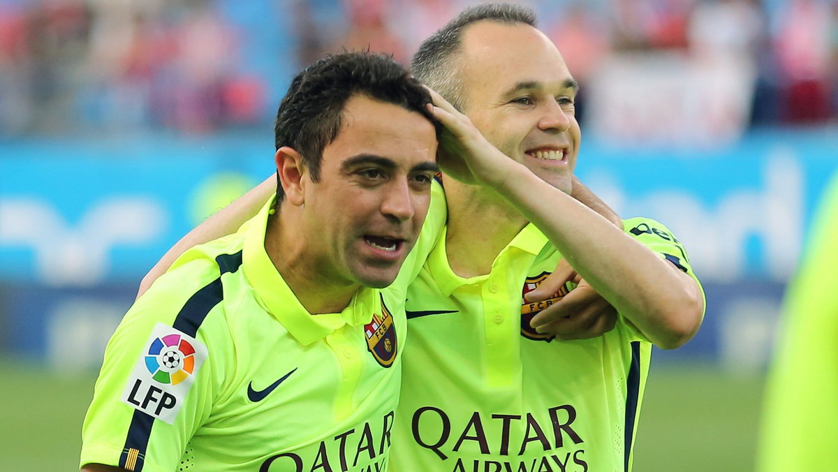 Xavi Hernandez i Andres Iniesta, fot. AFP PHOTO/ CESAR MANSO