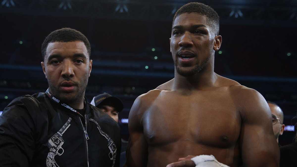 Anthony Joshua with Watford's Troy Deeney after the fight