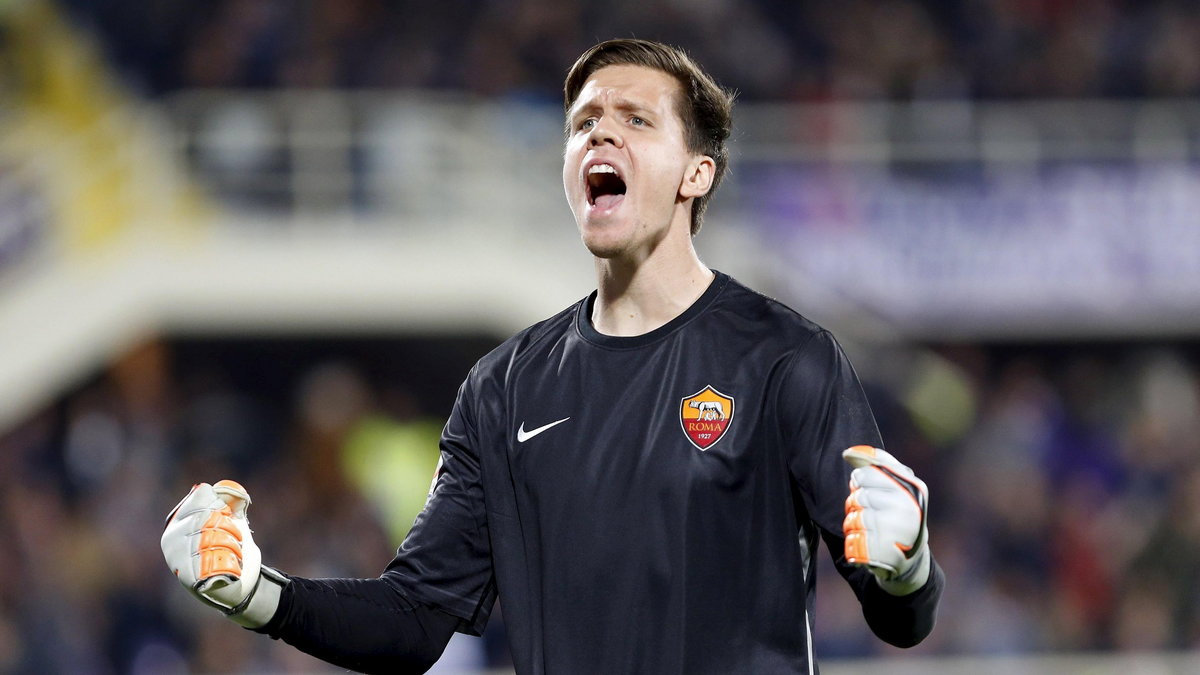 AS Roma's goalkeeper Szczesny reacts after his teammate Gervinho scored against Fiorentina during their Serie A soccer match in Florence