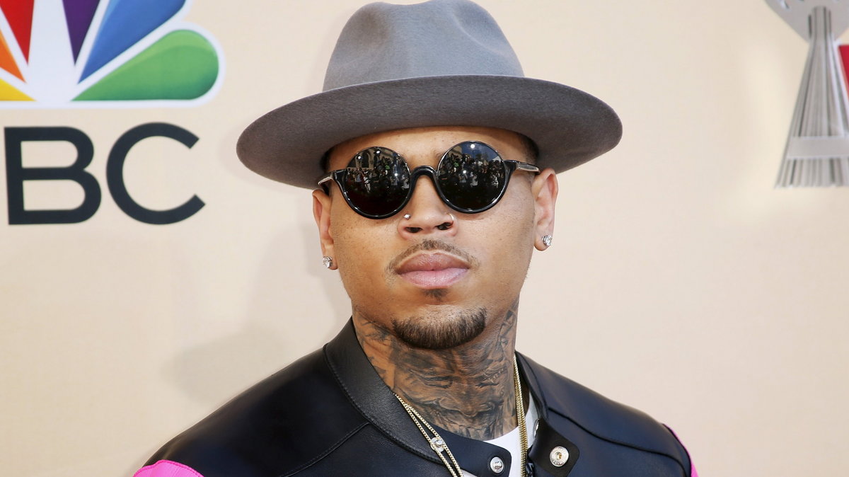 Singer Chris Brown poses at the 2015 iHeartRadio Music Awards in Los Angeles