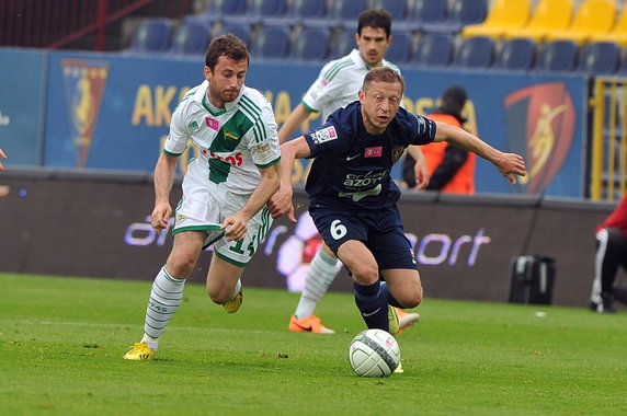 PIŁKA NOŻNA LIGA POLSKA POGOŃ SZCZECIN LECHIA GDAŃSK (Rafał Murawski Piotr Wiśniewski )